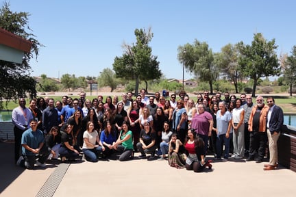 Group photo outside in a park of ThrivePoint High School staff and leadership