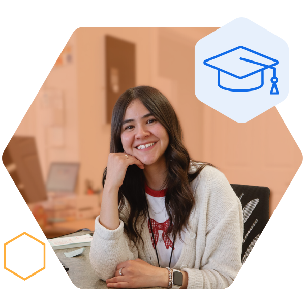 student success coach sitting down at a desk