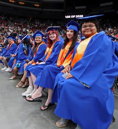 graduating students sitting down at the ceremony