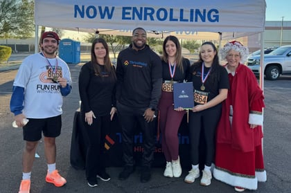 Staff at a 5k run to support ThrivePoint families