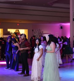 students at prom dancing